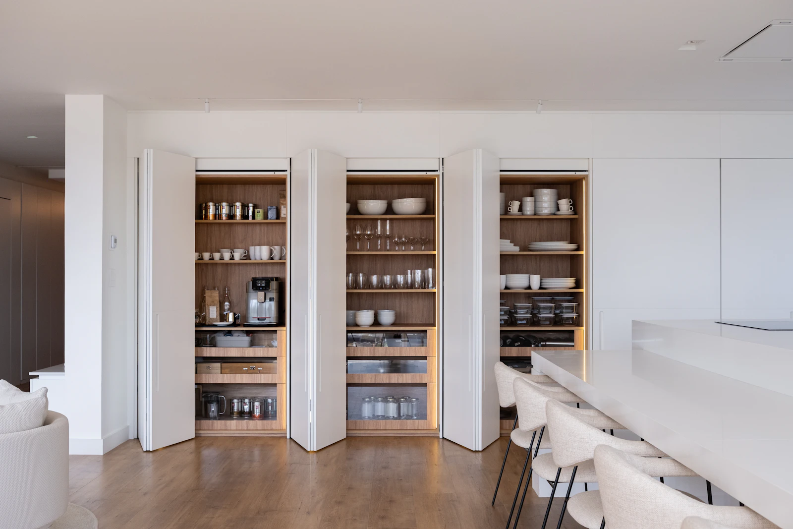 Beautifully organised kitchen cabinetry in a calm, contemporary home